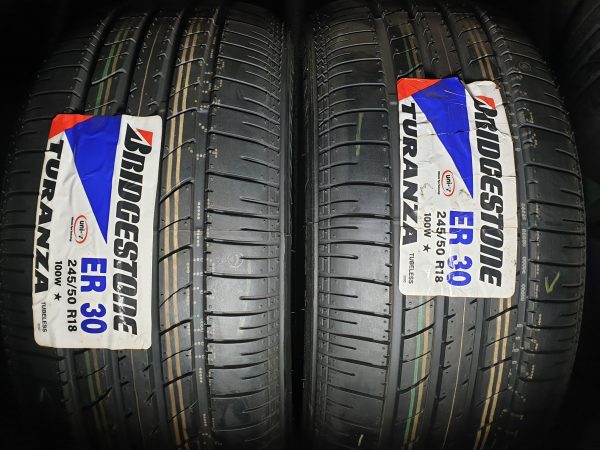 2x Bridgestone 245/50R18 100W ER30 * Zomerbanden Dot 2009, marge factuur.